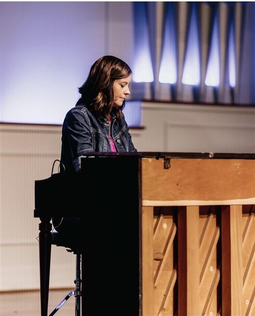 Mrs. Hartley plays piano