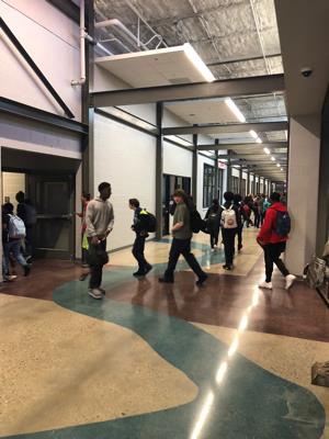 Holt hallway with students changing classes 