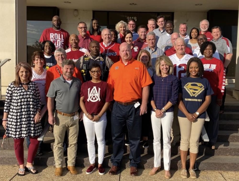 TCSS administrators dressed in team colors. TCSS administrators dressed in team colors.