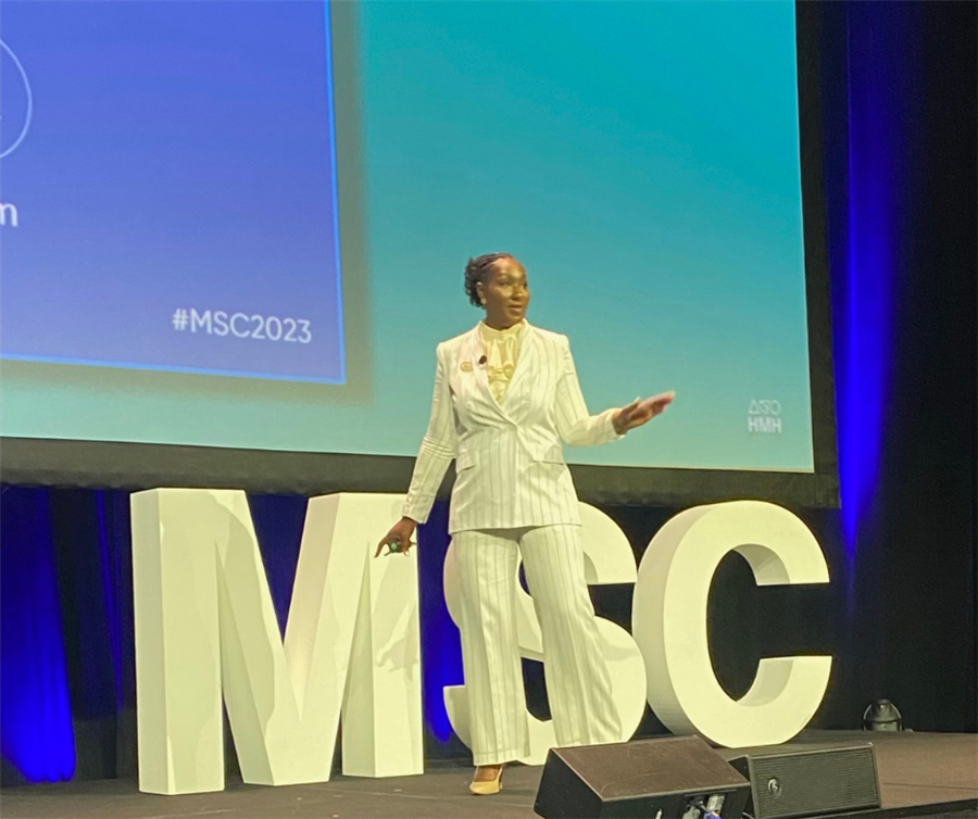 dr prince on stage at model schools conference