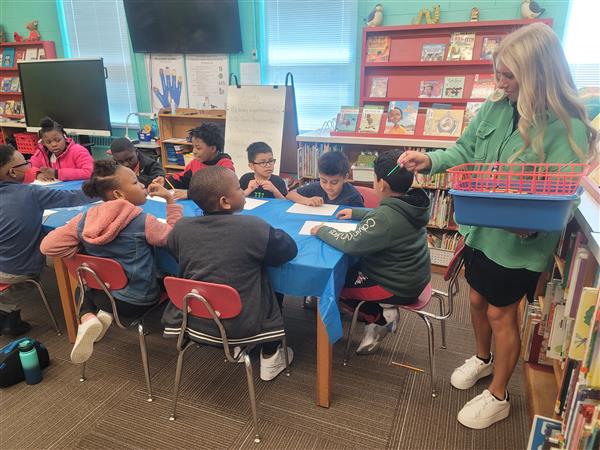 Emerging Super Leaders are enjoying a cookie and painting party for meeting their 3rd Nine Week Accelerated Reading Goals! Showing Perseverance, these 3rd and 4th grade students always stay on task.