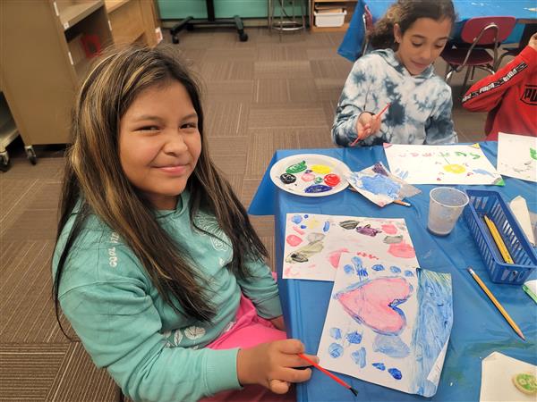 Emerging Super Leaders are enjoying a cookie and painting party for meeting their 3rd Nine Week Accelerated Reading Goals! Showing Perseverance, these 3rd and 4th grade students always stay on task.